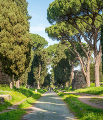The ancient Appian Way (Appia Antica) on a sunny spring morning, in Rome.