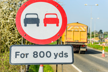 No Overtaking 800 yards Zone sign on UK motorway with lorry on background