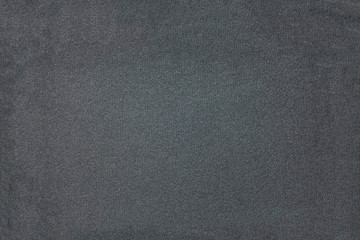 Black background texture of black cloth closeup