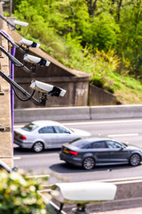 Fototapeta premium Row of Speed cameras monitoring traffic on UK Motorway