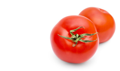 Two ripe tomatoes on white background. Copy space.