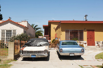 Two old cars in Los Angeles, USA.