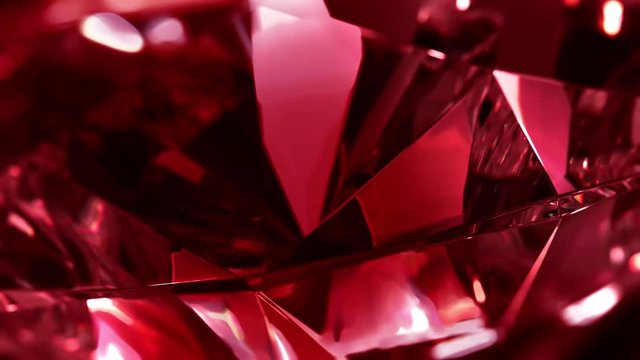 Close-up of slowly rotating red diamond. Seamless loop, nice looping background