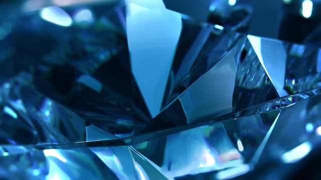 Close-up of slow rotate blue diamond. Loopable, beautiful background
