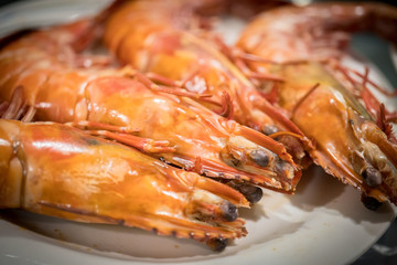 A plate of delicious and fresh stirfried king prawns.