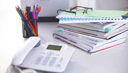 Workplace with notebook laptop Comfortable work table in office windows and city view