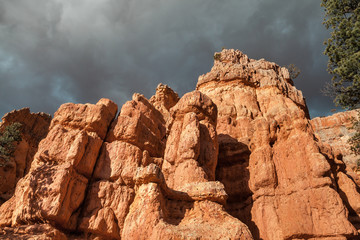 Closeup Of Hoodoo Rocks And Dramatic Sky Near Red Canyon
