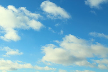Beautiful blue sky and cumulus clouds. Background. Landscape.