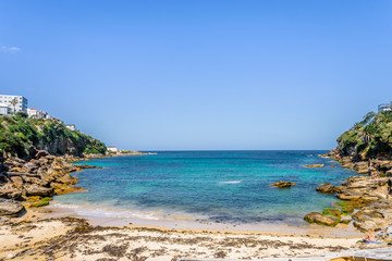 Sunny beautiful summer coast view to Sydney beach and blue Tasman Sea wild wave water and sandy white beaches perfect for surfing swimming hiking, Coogee to Bondi Walk, NSW/ Australia - 10 11 2017