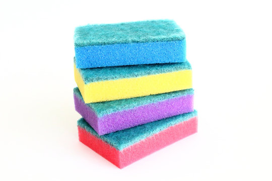 Colored sponges for washing dishes. Close-up. Isolated.