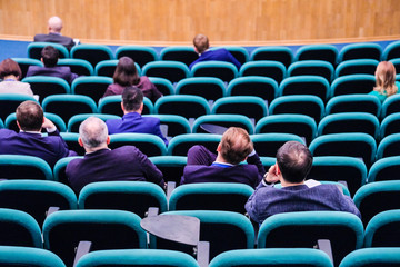 Naklejka premium Moscow, Russia - April, 13, 2018: People on a conference