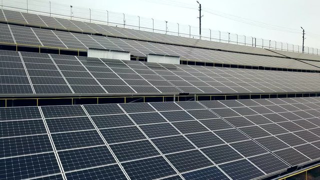 Solar panels. Power station. Blue solar panels. Alternative source of electricity. Solar farm. Source of ecological renewable energy.