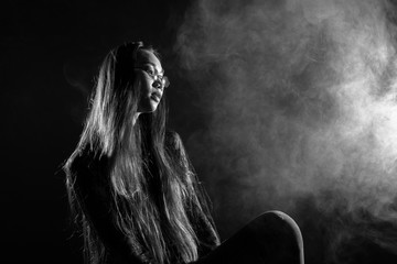 broken heart lonely girl can cry, smoke Fog on dark Background