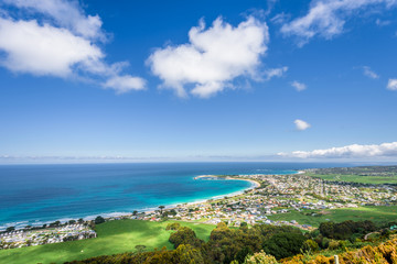 Relaxing at the blue Bass Strait sea and enjoying a warm sunny beach view over blue sky water of...