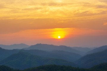 Aerial view of mountain range with warm sunlight, shade and shadow, sunset sunrise from Mae Hong Son province Thailand