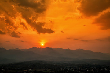 Aerial view of mountain range with warm sunlight, shade and shadow, sunset sunrise from Mae Hong Son province Thailand