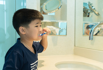 boy used a toothbrush