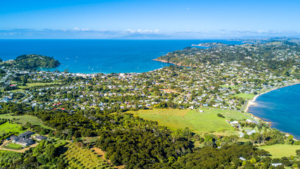 Aerial view on beautiful bay at sunny day with sandy beach and residential suburbs on the...