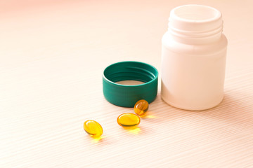 Bottle with birth control pills . On light background