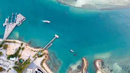 Aerial:  Boat pass water channel near  Phangan island,the one of the most important tourist destination in Thailand
