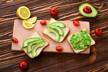 Avocado sandwich on a bread made with fresh sliced avocados from above
