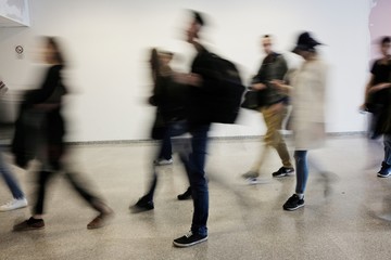 blurry people at the airport