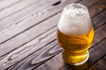 Small glass of light beer