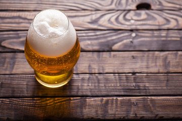 Small glass of light beer