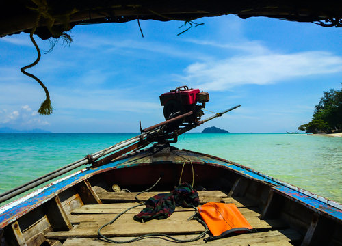 Boat sailing at Koh Bulone island beach, Satun