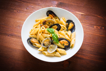 Penne allo scoglio, dish of italian pasta with clams and mussels, Mediterranean Food