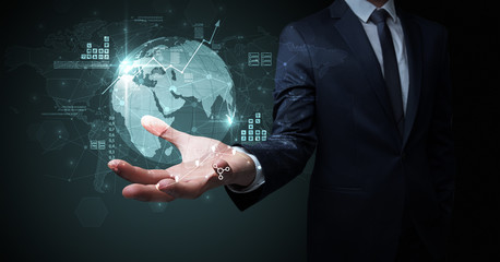 Fototapeta premium Businessman handing transparent global information flow concept on his hand
