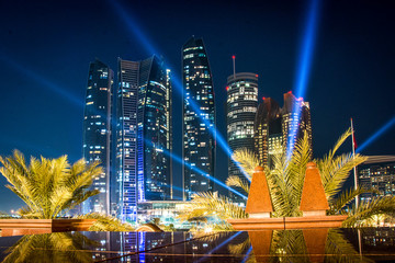 View of Abu Dhabi skyline at night, United Arab Emirates