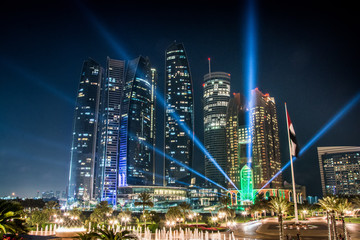 View of Abu Dhabi skyline at night, United Arab Emirates