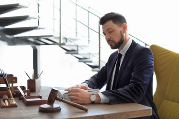 Male lawyer working in office