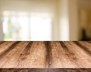 Wooden empty table board in front of blurred background. Can be used for display or montage any product. Mock up for display your product.