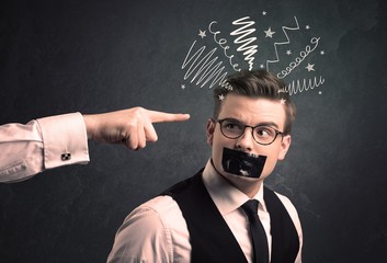 Caucasian business hand pointing at uncumprehended employee