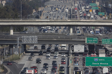 CARS AND SIGNS ON 405 FREEWAY