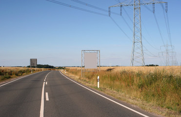 Fototapeta premium Advertising: Not to be overlooked billboard on the edge of a federal road in Germany