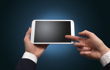 Hand using tablet with no concept and empty space
