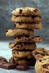 Fototapeta na wymiar Chocolate cookies on rustic table. Chocolate chip cookies