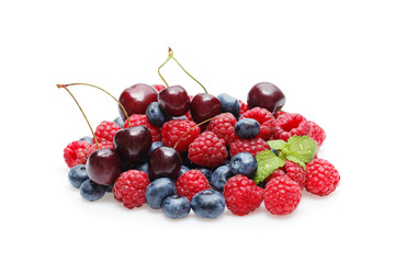 blueberry, cherry and raspberry berries isolated on white background