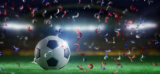 Football ball on the field of a world cup stadium with  streamers - 3d rendering
