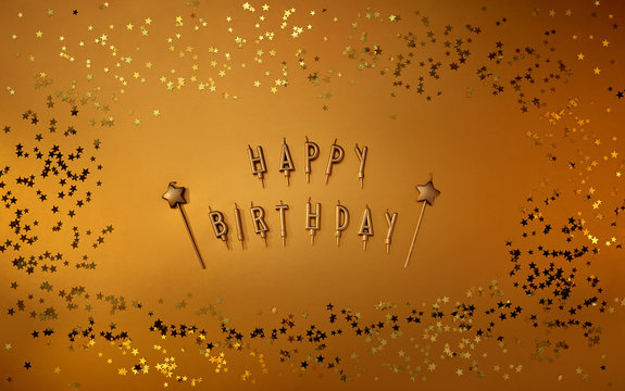 Top View Of Gold Back Background Happy Birthday.