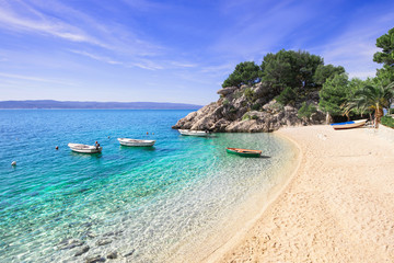 Beautiful beach near Brela town, Dalmatia, Croatia. Makarska riviera, famous landmark and travel touristic destination in Europe - obrazy, fototapety, plakaty