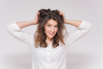 Naklejka premium beautiful girl on a white background in different poses