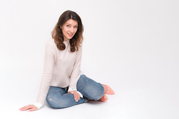 beautiful girl sitting on the floor in different poses