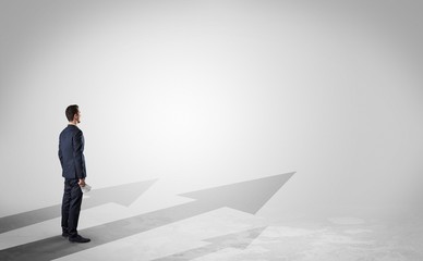 Obraz premium Man with object in his hand on the direct way to success