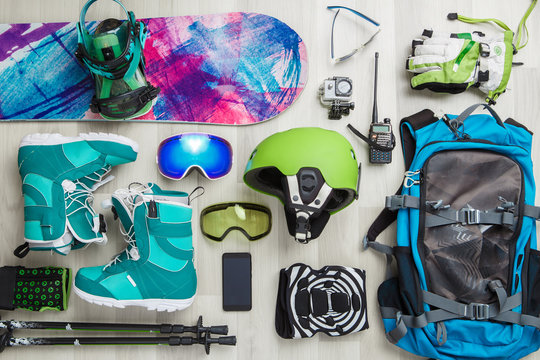Image of snowboarder objects on wooden background.