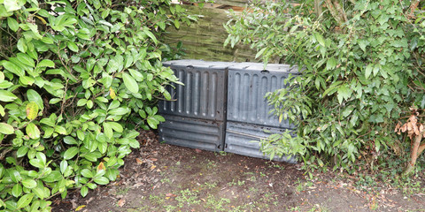 Black plastic composting bin for Making compost from green waste