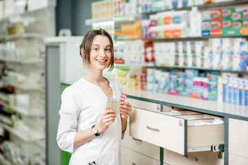 Gordijnen Pharmacist portrait in the pharmacy store © rh2010